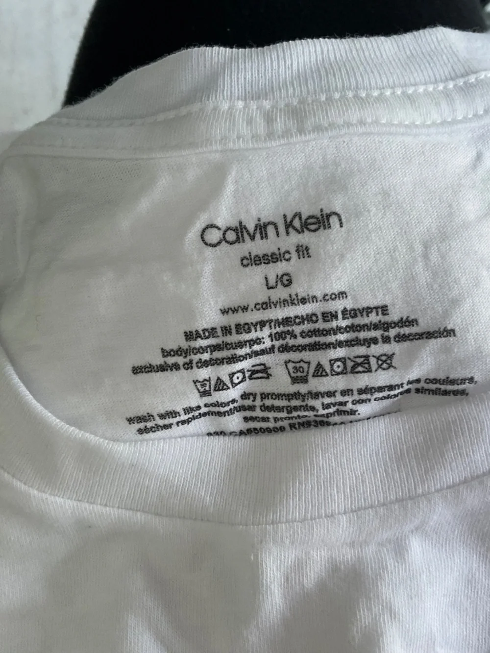 Calvin Klein white tee shirts,new in box.L.